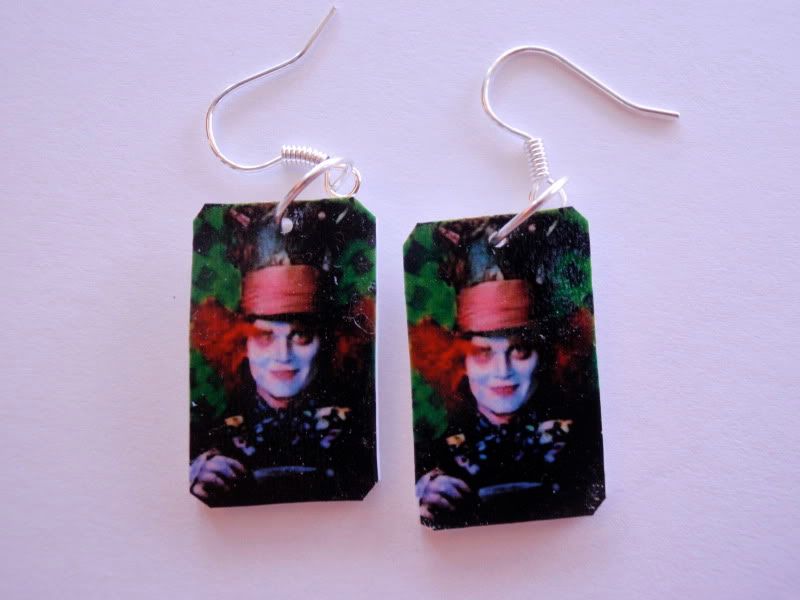 johnny depp earrings. This is a pair of handcrafted earrings the famous JOHNNY DEPP in his new Alice in Wonderland Movie - starring as the Mad Hatter -made from plastic -light