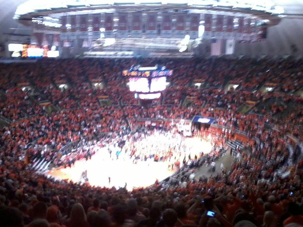 Illinois fans storm the court after the Illini upset number one ranked Indiana