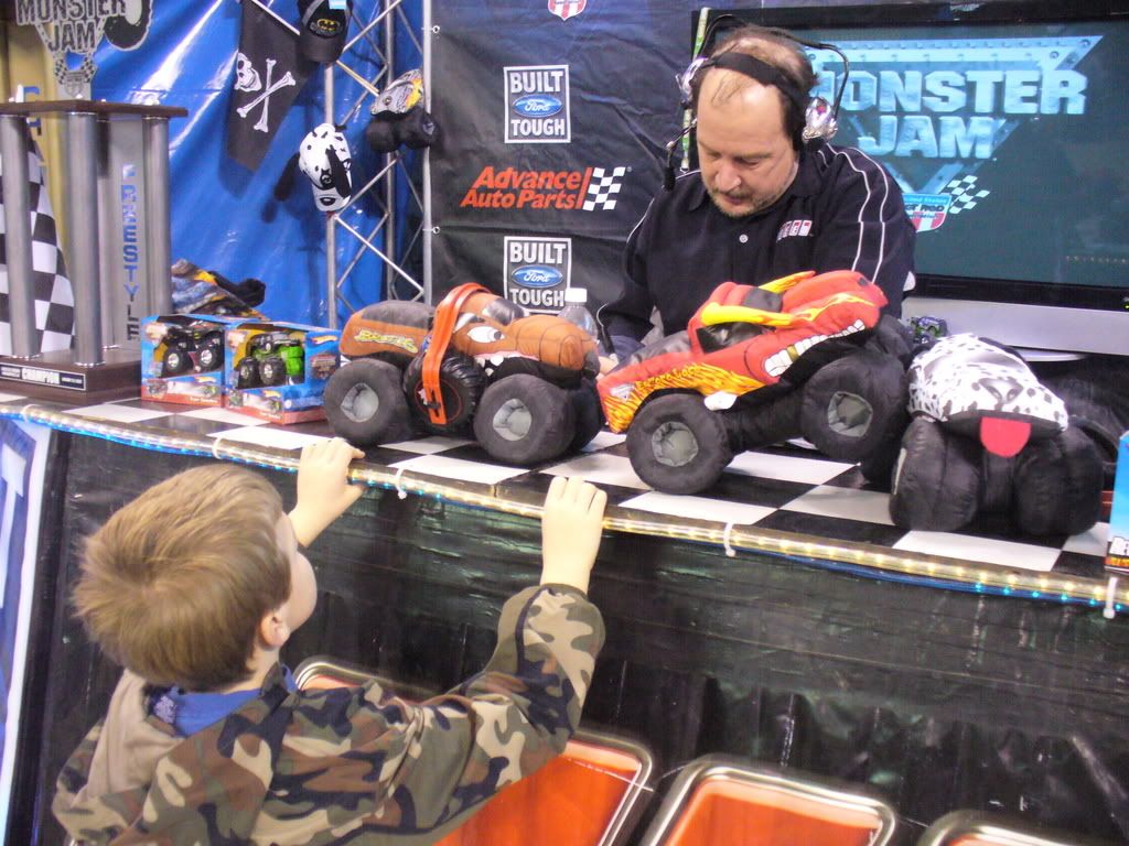 Scott Douglas As we were leaving the pit party, Aiden saw the announcer, Scott Douglas, and asked him for an autograph.