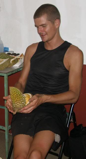 Harley enjoying a durian in Thailand.