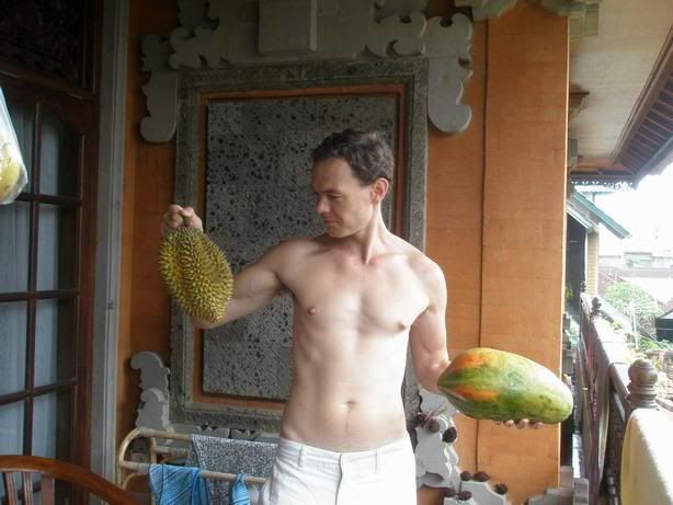 Petr holding one durian, and one papaya