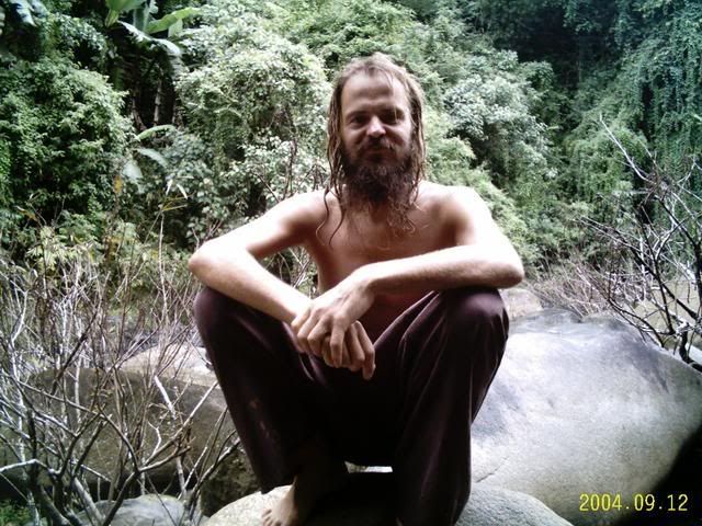 Sitting on a rock in the middle of a jungle